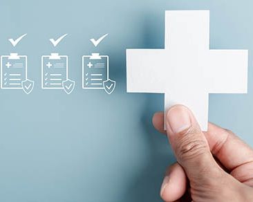 HealthcareInsuranceConceptWithMedicalCrossAndChecklistHealthCoverage - KSDT • Accountants & Advisors