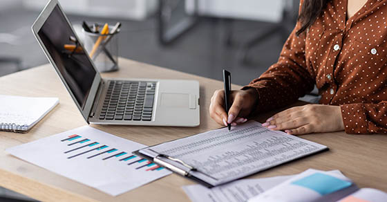 HandsOfFinancierClose-upFemaleAccountantOnPaperWorkFills